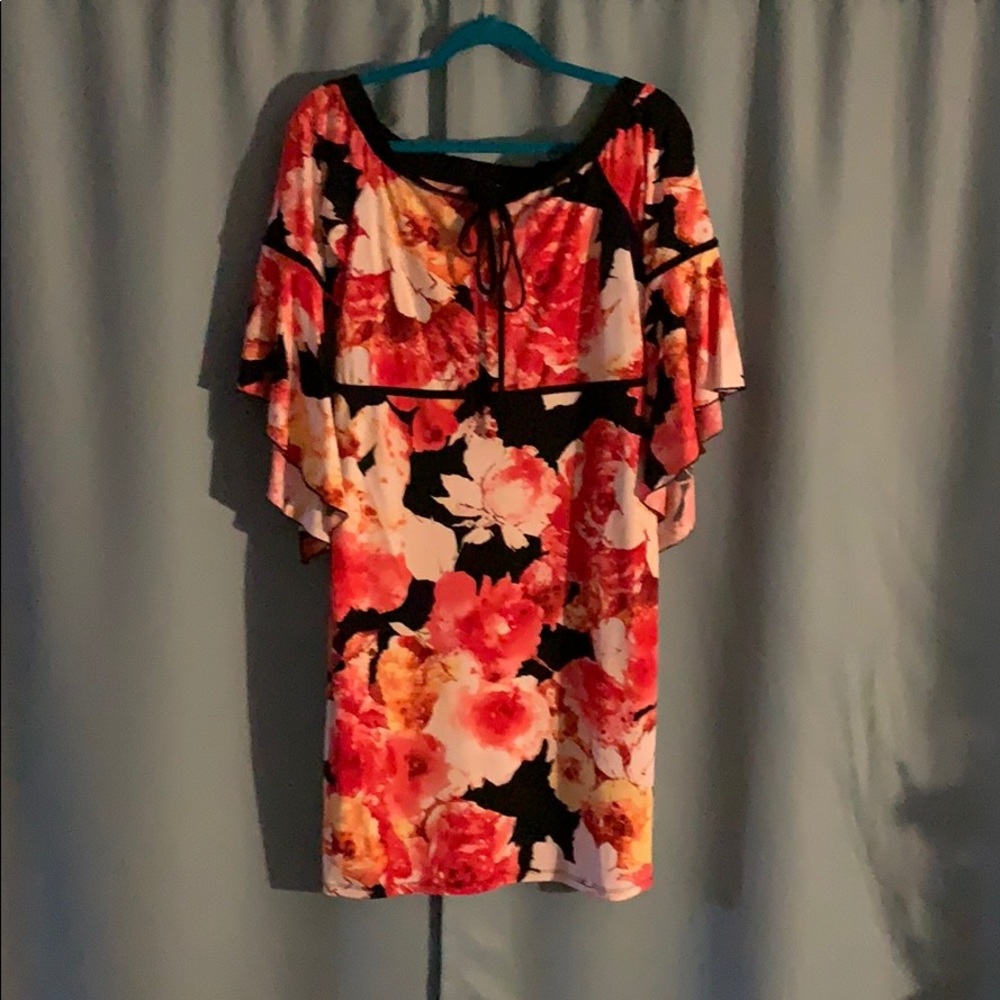 Lovely floral dress. Worn once to wedding.